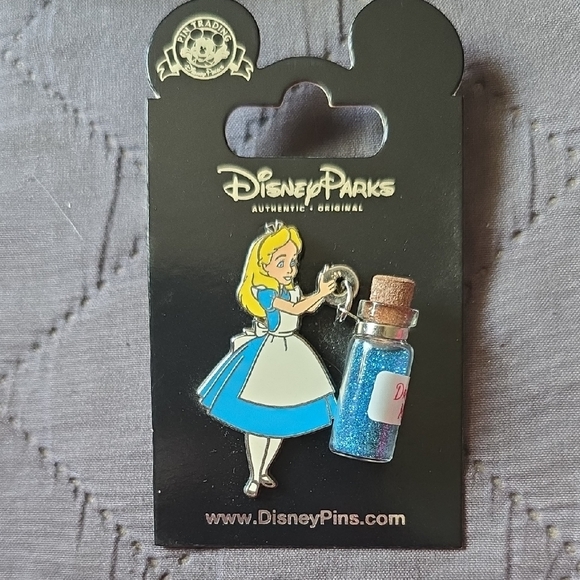 Disney Other - Disney Alice in Wonderland Pin with Blue Glitter Bottle